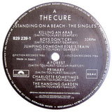 Standing On A Beach - The Singles