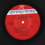 Caliente = Hot (Puerto Rican And Cuban Musical Expression In New York)